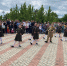 В парке у Вечного огня перед зрителями выступают участники районной художественной самодеятельности. - Гиагинский район